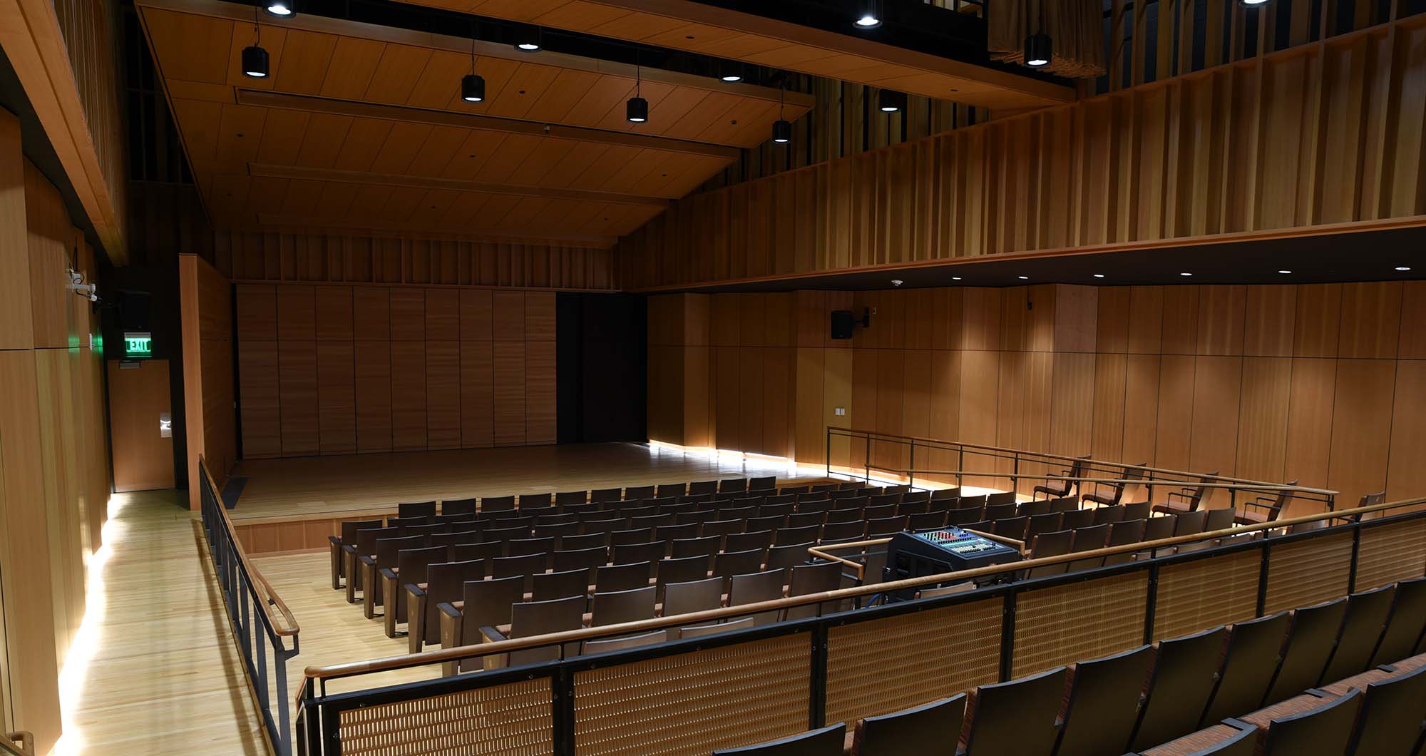 Control4 Touch panel in a able with a traditional home in the background